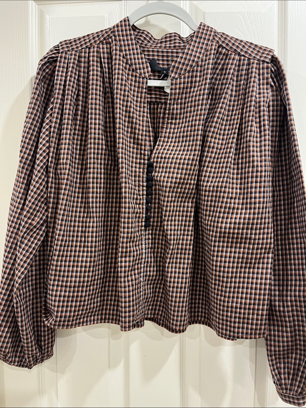 Flannel top with black buttons